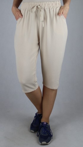 Spodnie damskie 3/4 rybaczki luźne kieszenie duże rozmiary beż