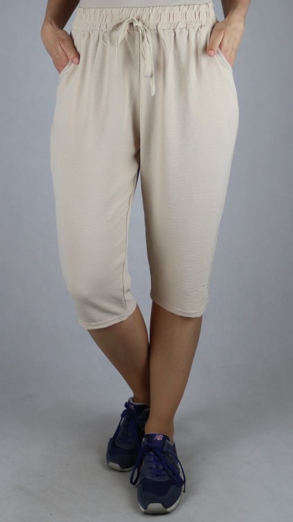 Spodnie damskie 3/4 rybaczki luźne kieszenie duże rozmiary beż