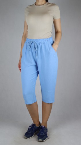 Spodnie damskie 3/4 rybaczki luźne kieszenie duże rozmiary jasno niebieski