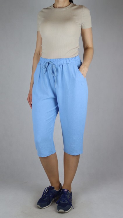 Spodnie damskie 3/4 rybaczki luźne kieszenie duże rozmiary jasno niebieski