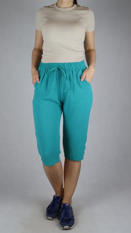 Spodnie damskie 3/4 rybaczki luźne kieszenie duże rozmiary zielone