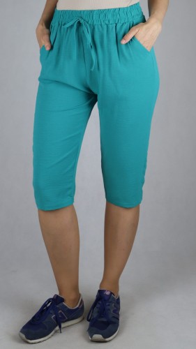 Spodnie damskie 3/4 rybaczki luźne kieszenie duże rozmiary zielone