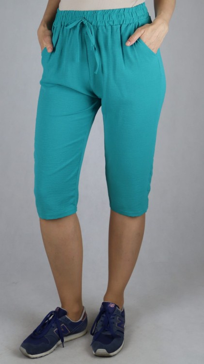 Spodnie damskie 3/4 rybaczki luźne kieszenie duże rozmiary zielone