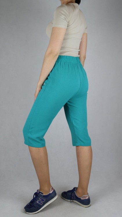 Spodnie damskie 3/4 rybaczki luźne kieszenie duże rozmiary zielone