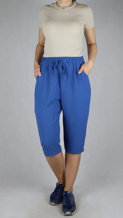 Spodnie damskie 3/4 rybaczki luźne kieszenie duże rozmiary niebieski