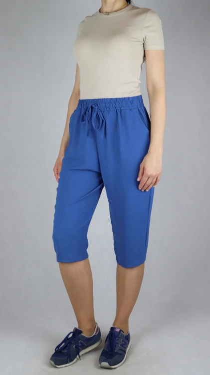 Spodnie damskie 3/4 rybaczki luźne kieszenie duże rozmiary niebieski