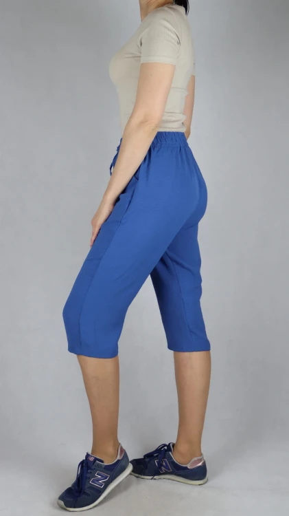 Spodnie damskie 3/4 rybaczki luźne kieszenie duże rozmiary niebieski