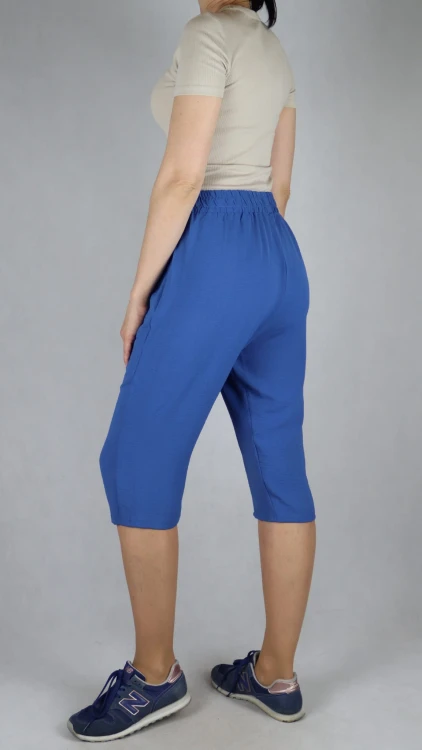 Spodnie damskie 3/4 rybaczki luźne kieszenie duże rozmiary niebieski